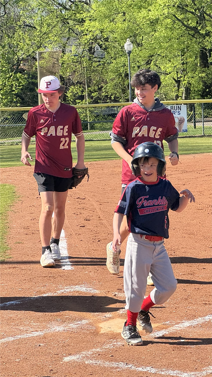 Students playing baseball